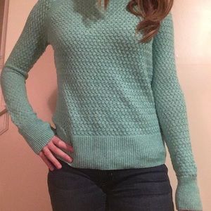 Mint green sweater with zipper detail